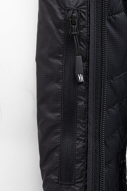 Aeroquest Hybrid veste isolante femme - détail des zips résistants à l'eau et ouvertures pour pouces